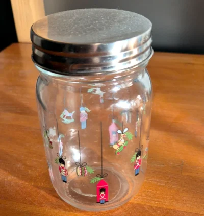Glaskrukke med gardermotiver